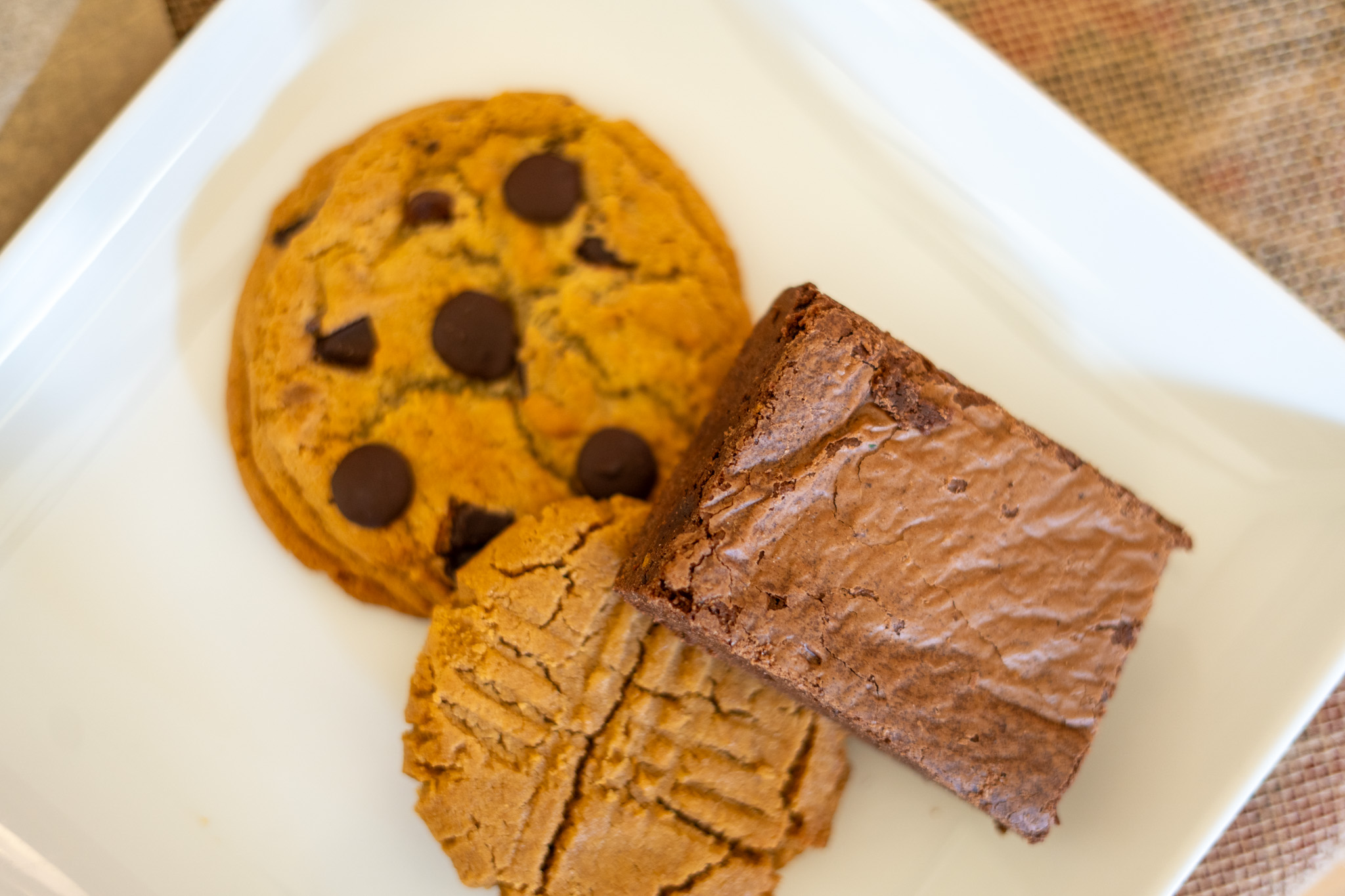 A trio of desserts from the Meristem Cafe that includes chocolate chip cookies, a peanut butter cookie, and a brownie