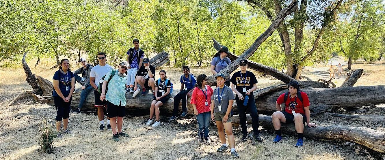 A group of students from Meristem's independent living programs for young adults with autism on a nature walk in the American River Parkway.